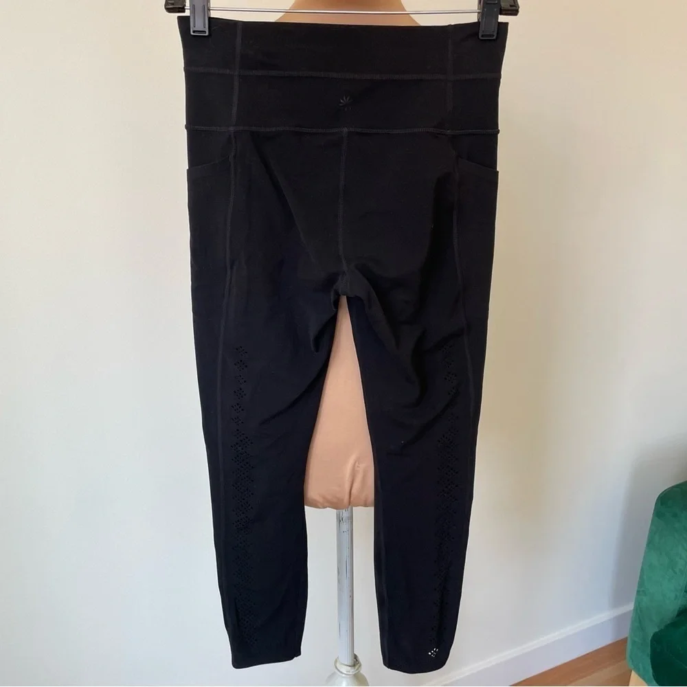 Athleta Black Niyama 7/8 Length Laser Cut Side Pockets Leggings 353777 EUC S